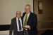 Dr. Nagib Callaos, General Chair, giving Prof. T. Grandon Gill an award "In Appreciation for Delivering a Great Workshop and Keynote Address at a Plenary Sessions"